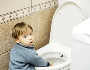 Baby on toilet