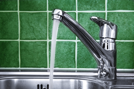 Faucet sink turned on